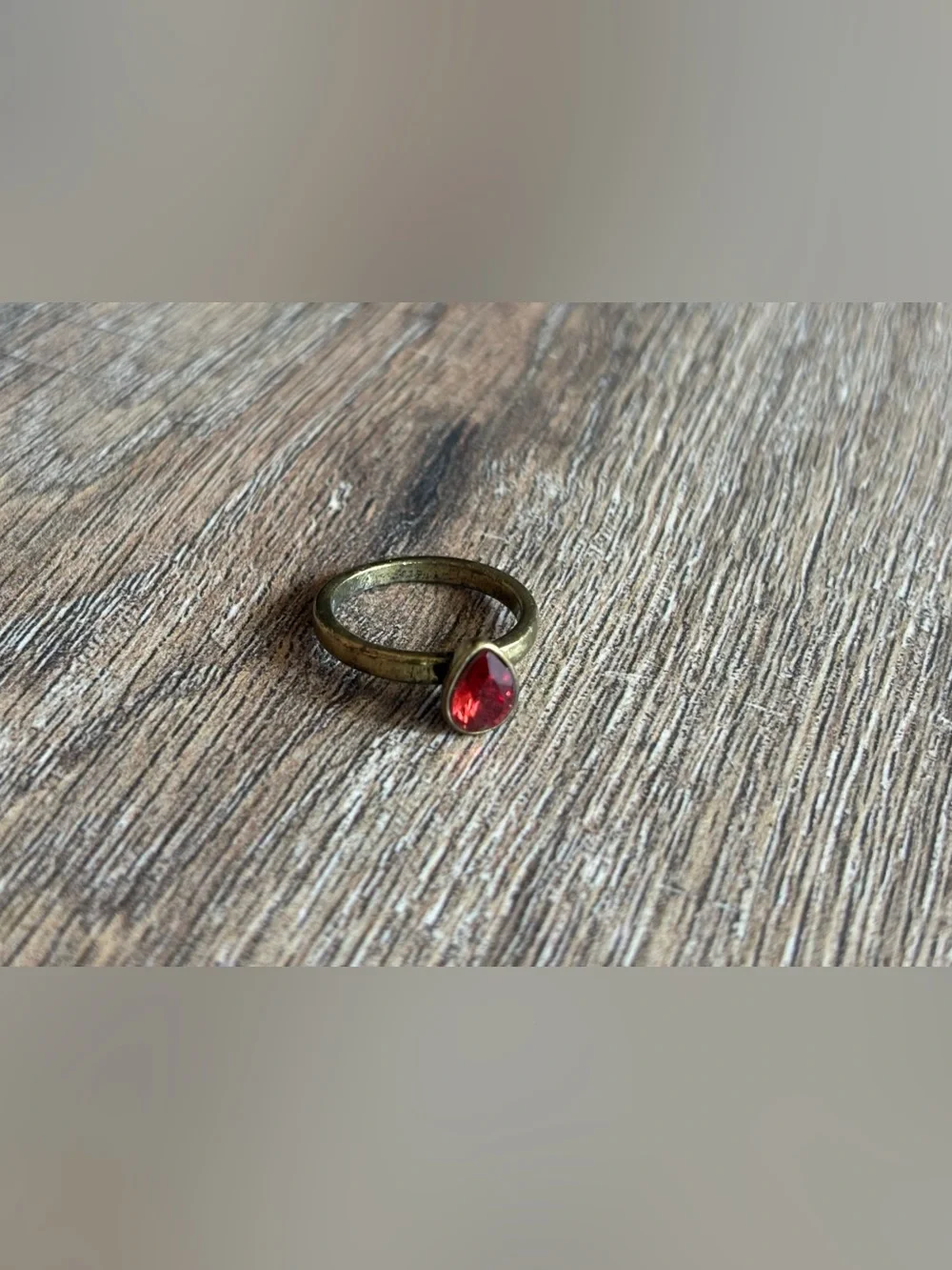 Fashion Jewelry Women’s size 10.5 brass tone pear shape red stone bezel ring